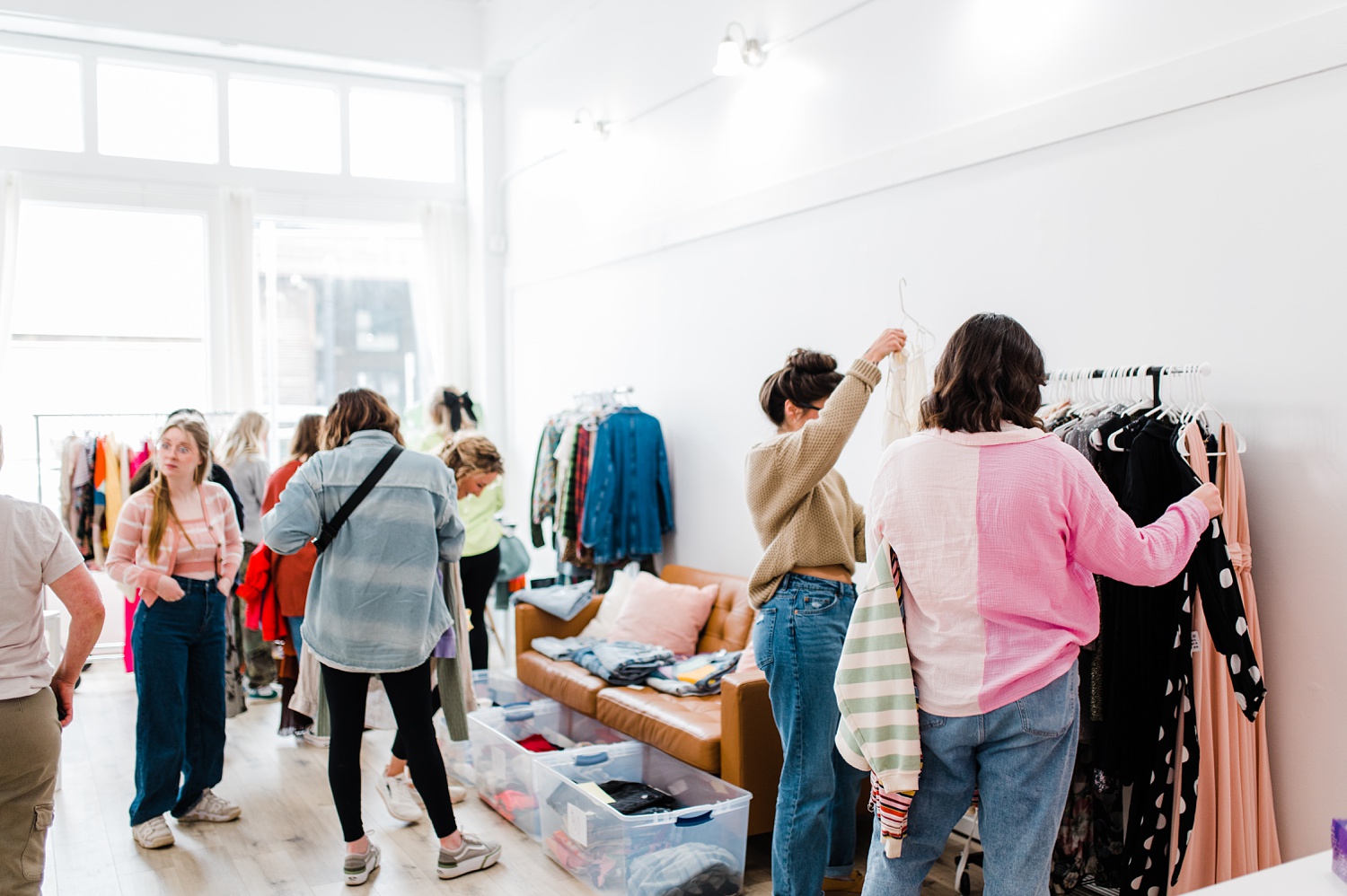 People shopping at a closet sale at Arc Creative Space
